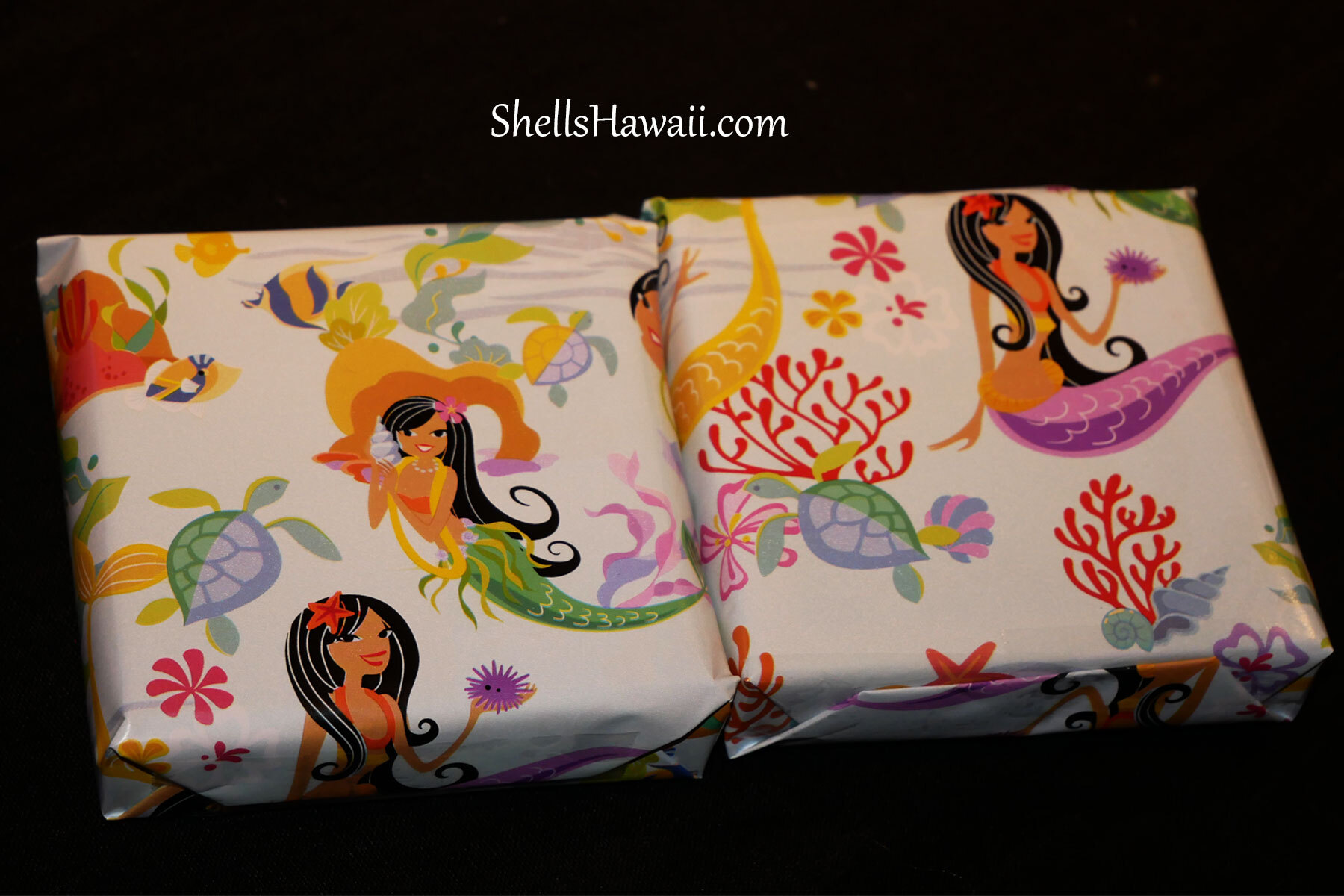 Mermaid Hawaiian gift wrap used for Niʻihau shell jewelry, ocean-inspired design carefully wrapped with aloha by ShellsHawaii