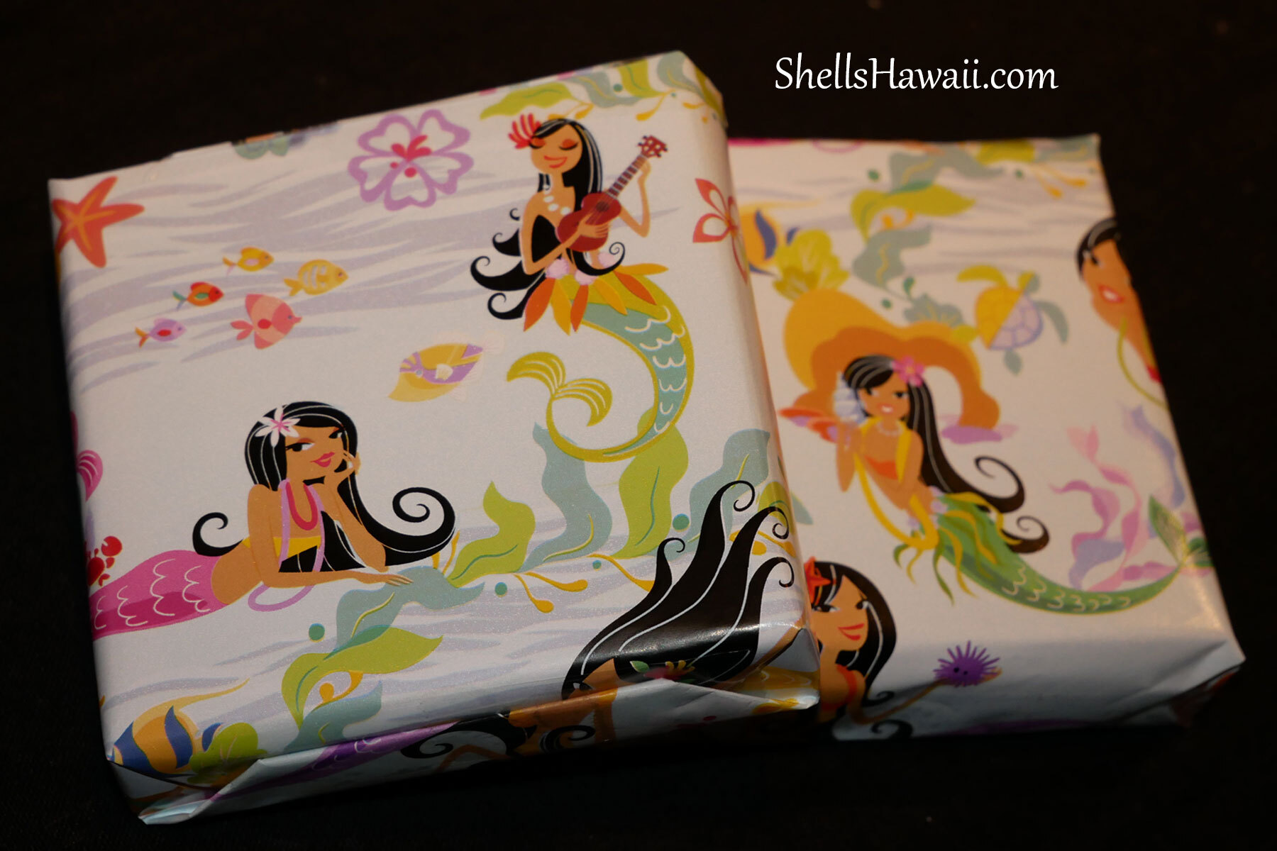 Mermaid-themed Hawaiian gift wrap for Niʻihau shell jewelry gifts, inspired by the ocean and island beauty