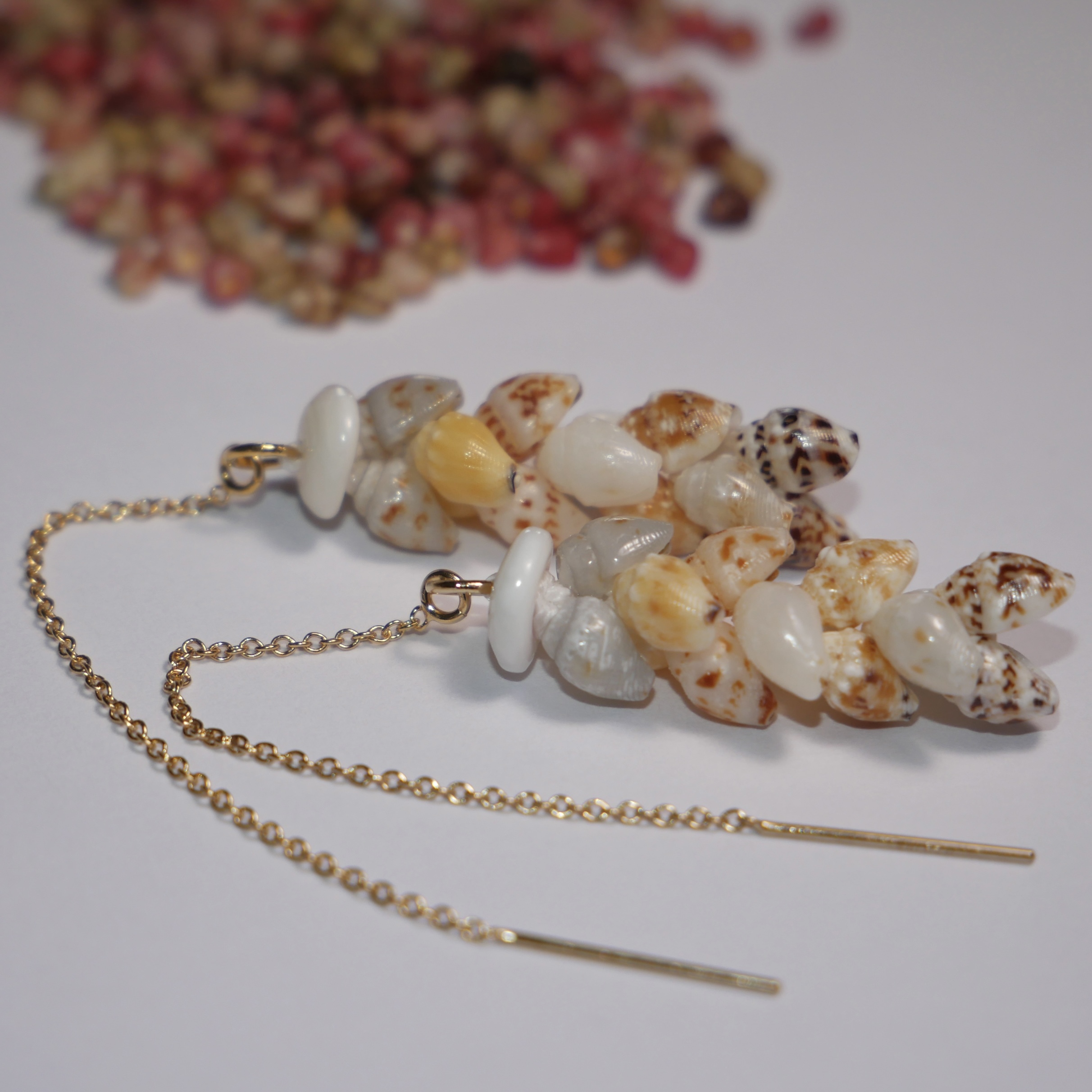 niihau pikake earrings using yellow momi shells to created