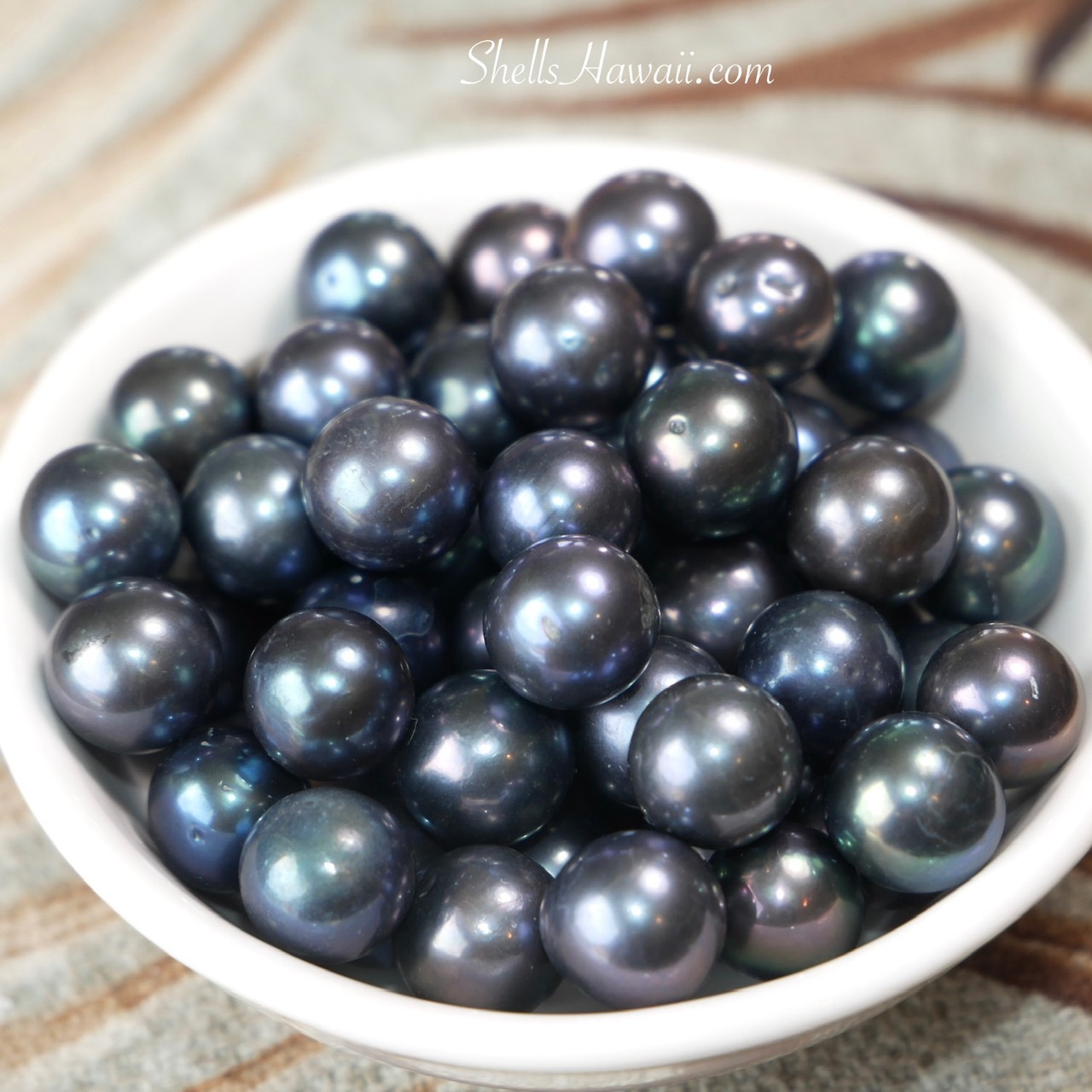 Dark Edison pearls with iridescent overtones and exceptional luster that will be used in future Niʻihau shell jewelry designs.