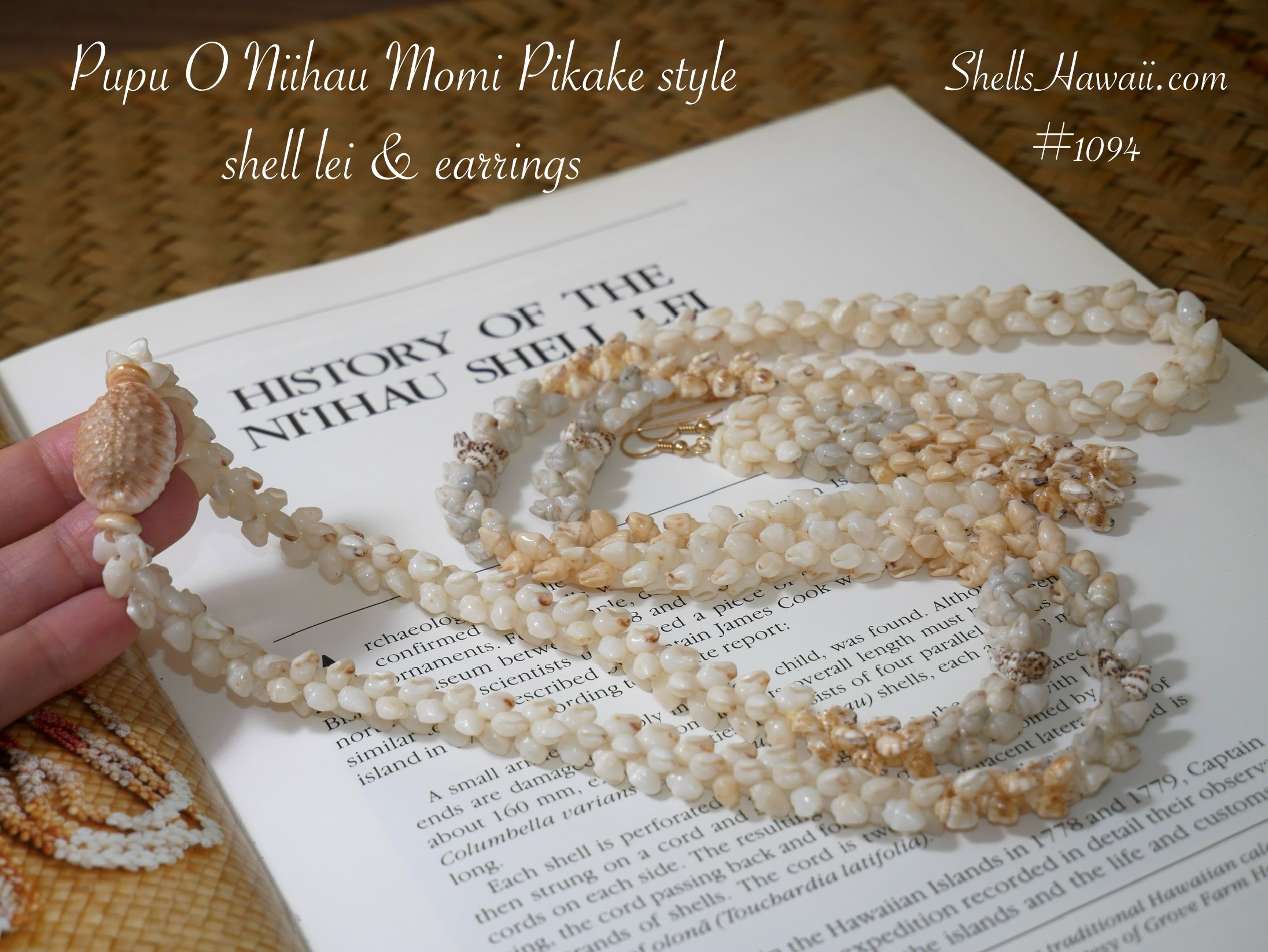 Single Pīkake style Niʻihau shell lei and earrings made with Momi shells, showing a soft braided pattern with creamy off-white shells and natural brown accents displayed on a book background