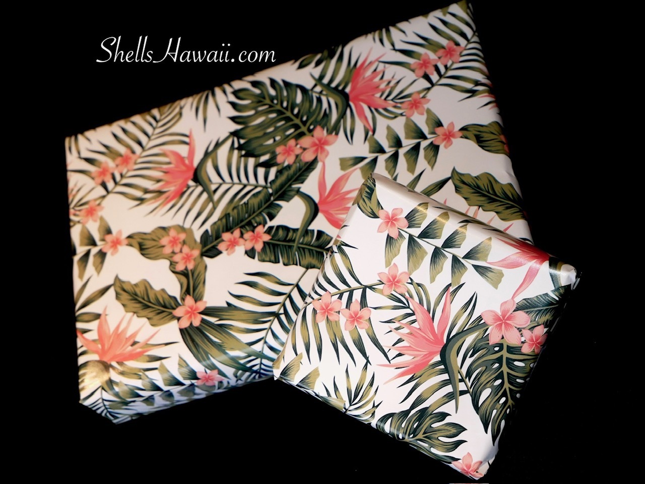 Hawaiian gift wrap packaging with tropical floral print, ShellsHawaii.com gift wrapping for Niʻihau shell jewelry and handmade Hawaiian gifts.