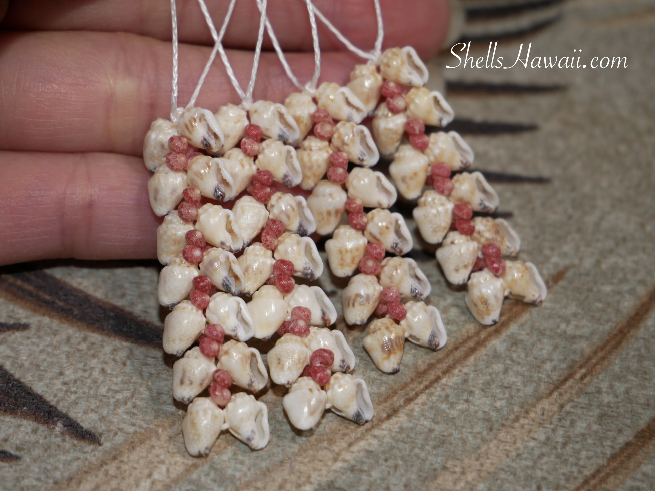Two tone Niʻihau shell Heleconia earrings with momi shells and kahelelani shells, handcrafted Hawaiian jewelry design