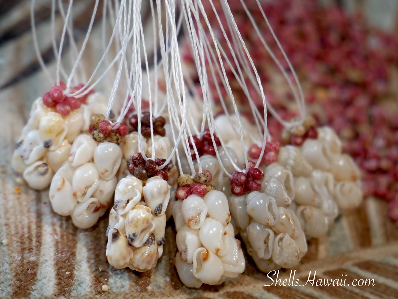 Hawaiian pineapple design in progress featuring Momi and Kahelelani shells, handmade Niʻihau shell jewelry creation waiting for Laiki shells to complete the top pineapple crown
