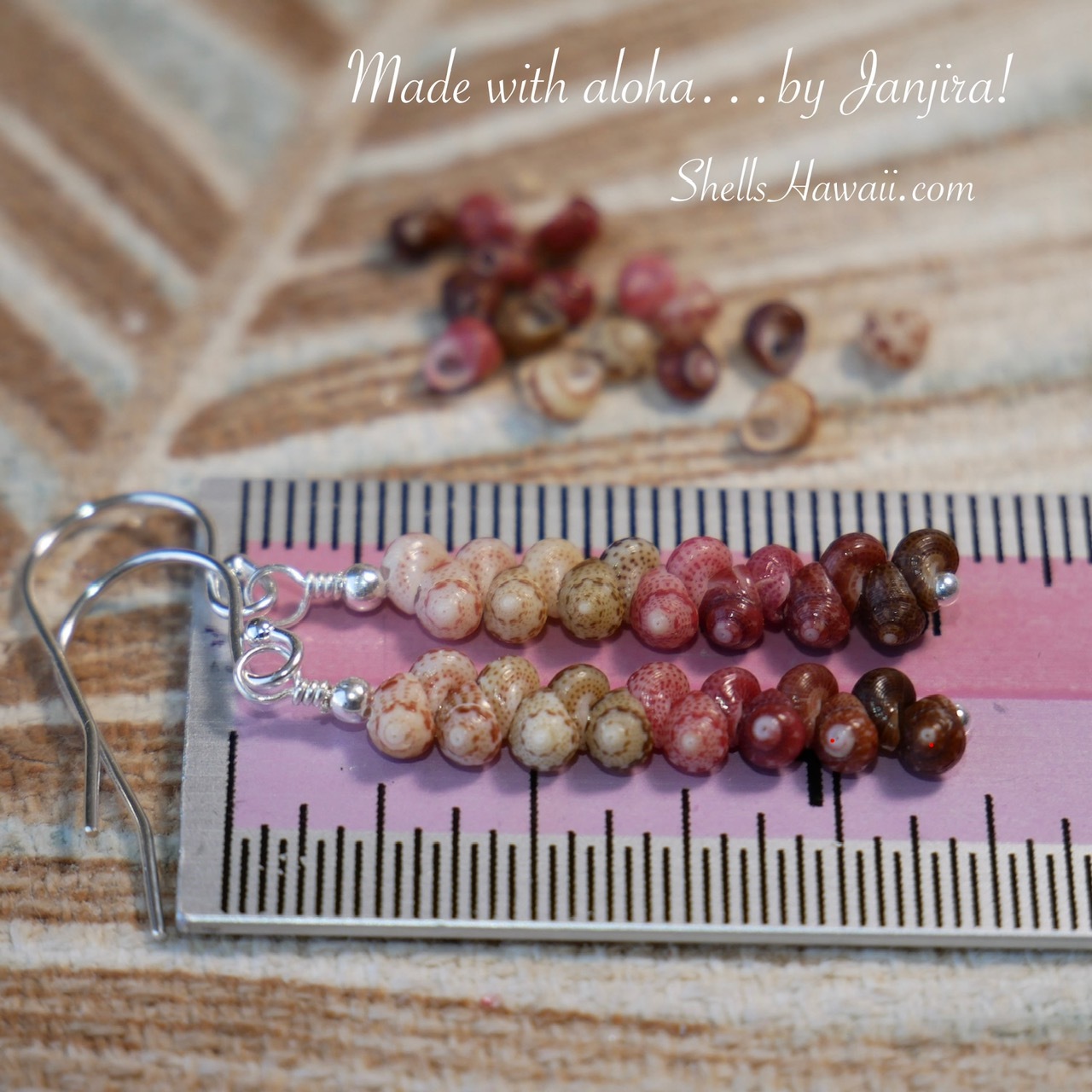 Niʻihau shell earrings measurement example showing length measured from top of hook to bottom of shells using ruler for accurate size reference