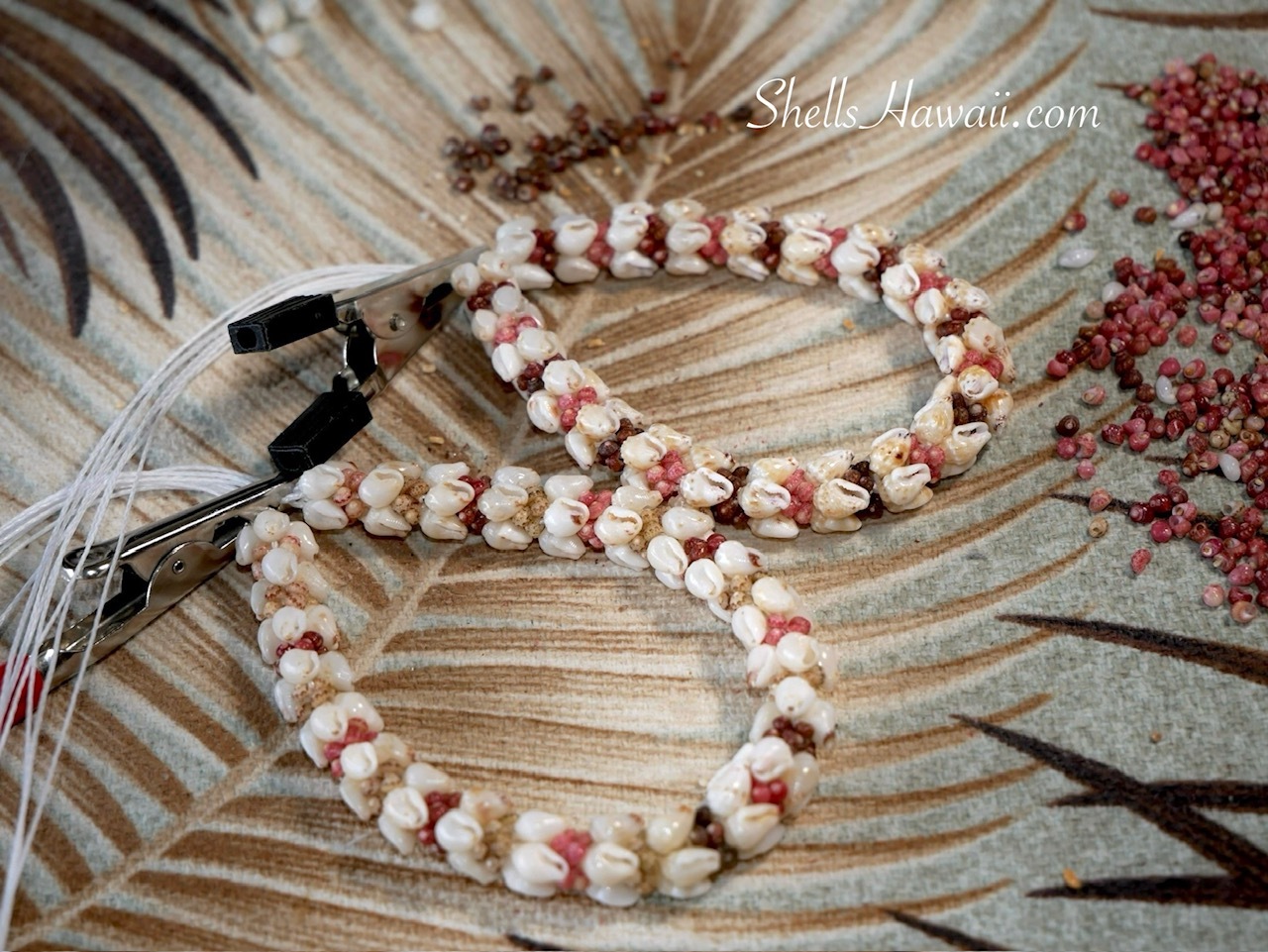 Overall look of handmade Kipona style shell bracelets after the stringing process is completed and waiting for the clasps to be finished. The bracelets feature carefully matched Momi and tiny size 10 Kahelelani shells from Niʻihau, highlighting the fine workmanship, balanced shell placement, and traditional Hawaiian Kipona style design.